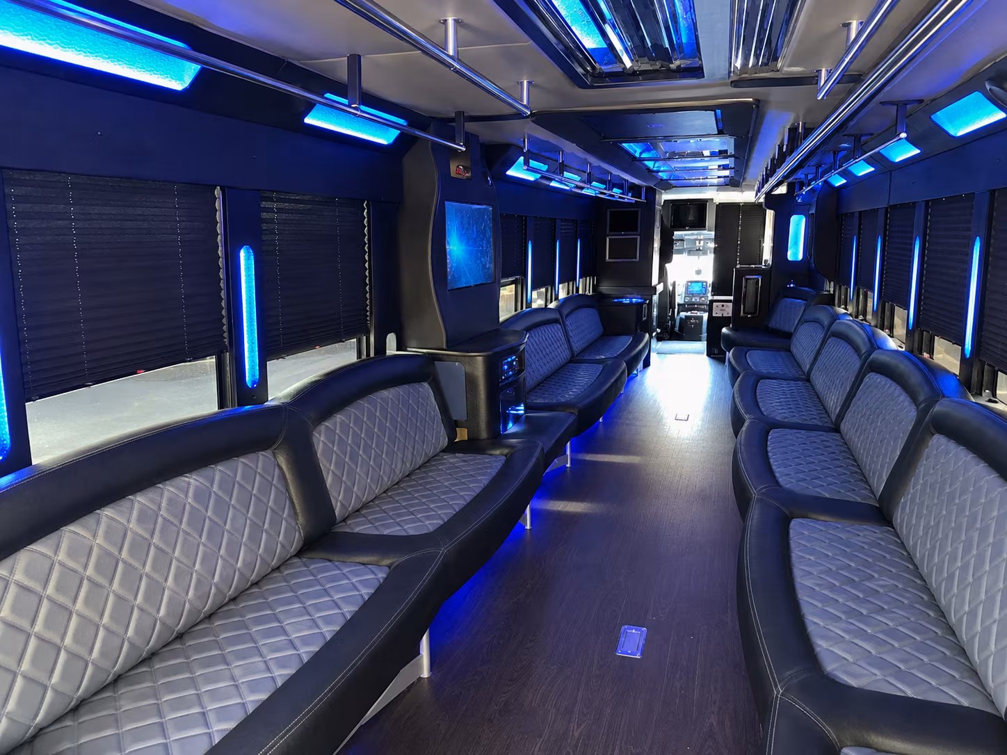 Wedding guests seated inside a party bus serving Raleigh